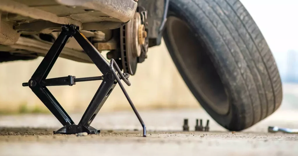 How to jack up a motorcycle with a car jack